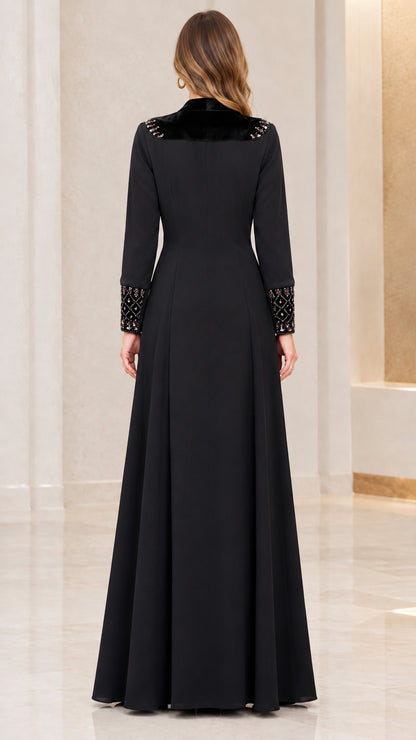 Back view of model showcasing black maxi dress with velvet collar detail