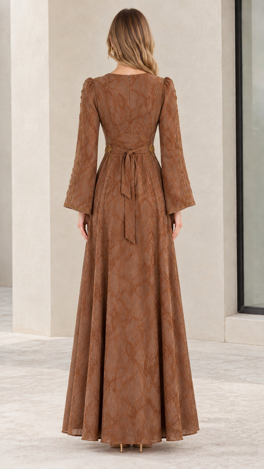 Back view of brown jacquard maxi dress showing back tie and zipper closure