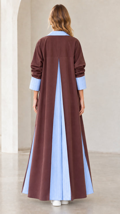 Back view of women's brown longline coat showcasing deep inverted striped back pleat