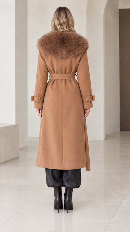 Back view of model wearing camel faux fur collar long coat with belted waist