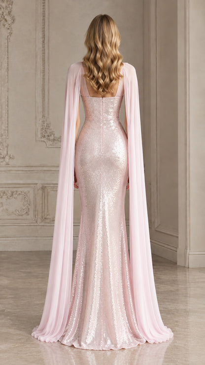 Back view of blush pink sequin floor-length formal gown showing cape drape