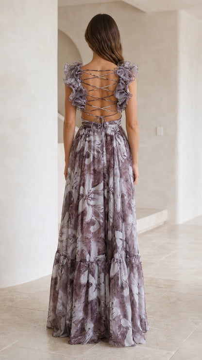 Back view of dusty purple floral maxi dress showing criss-cross lace-up back