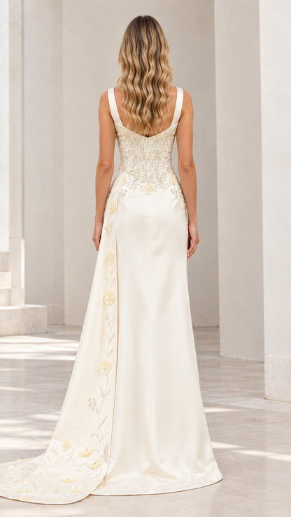 Back view of ivory satin corset evening dress showing train detail