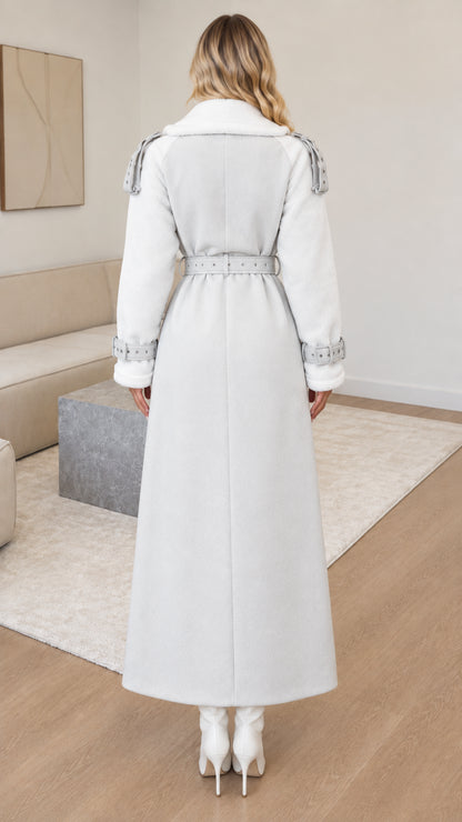 Back view of woman wearing belted light grey maxi overcoat