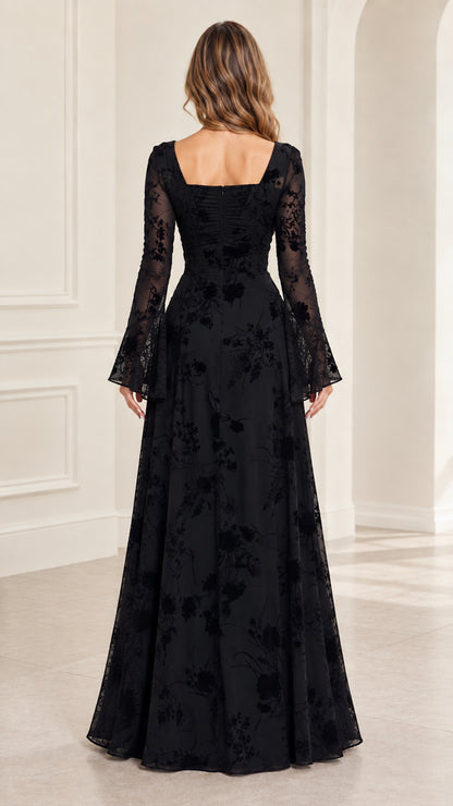 Back view of model showing square back neckline and hidden zip on black maxi dress