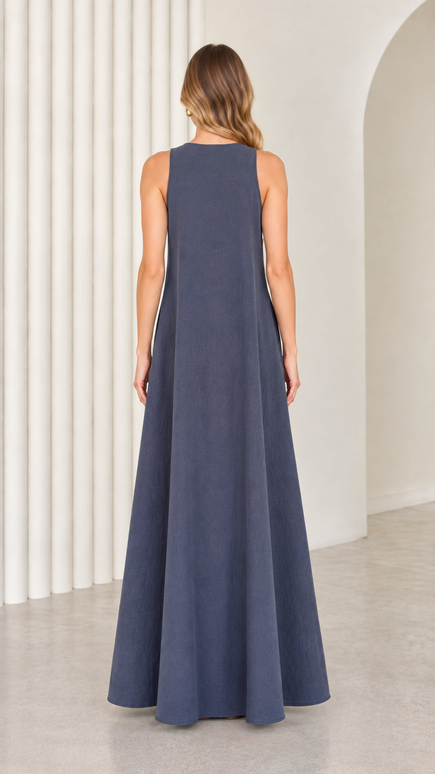 Back view of model wearing the high-neck sleeveless slate blue maxi dress