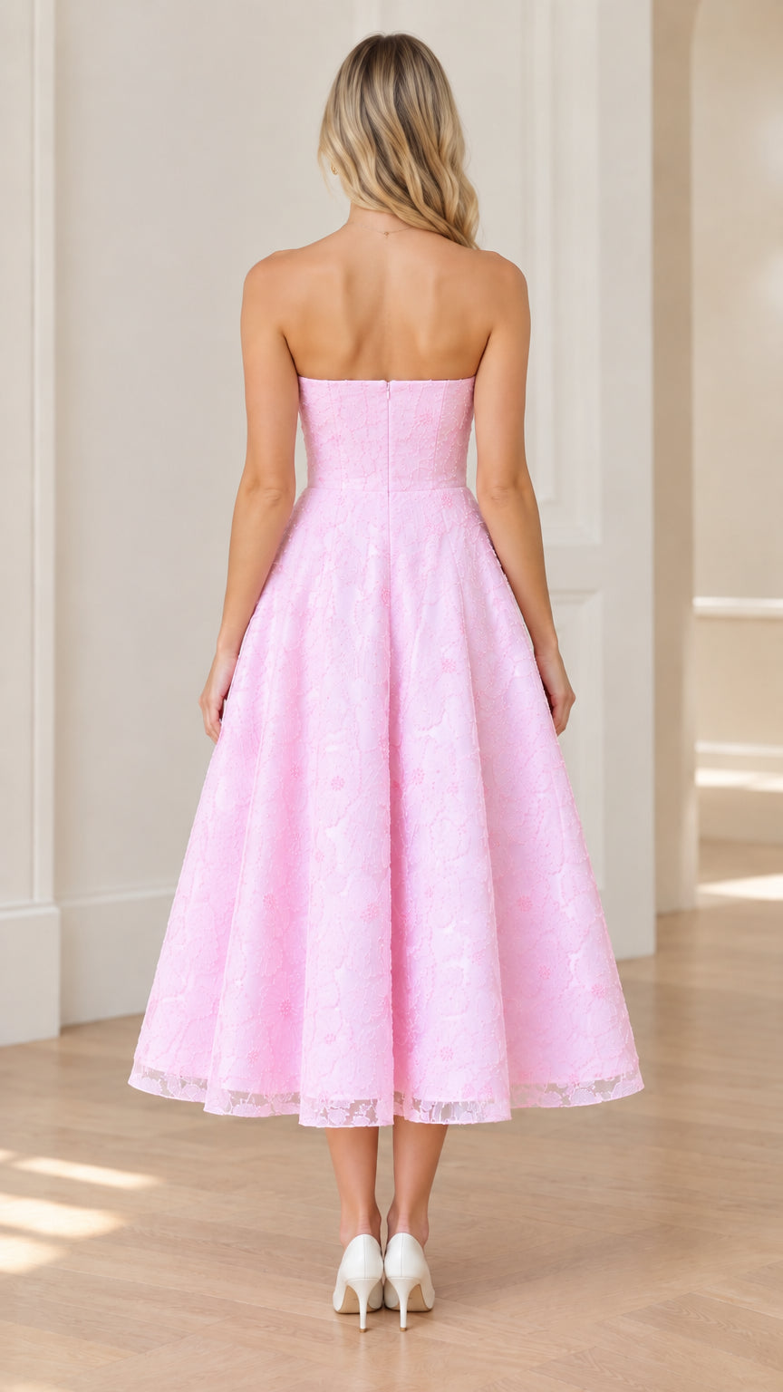 Back view of woman wearing strapless pink lace cocktail midi dress