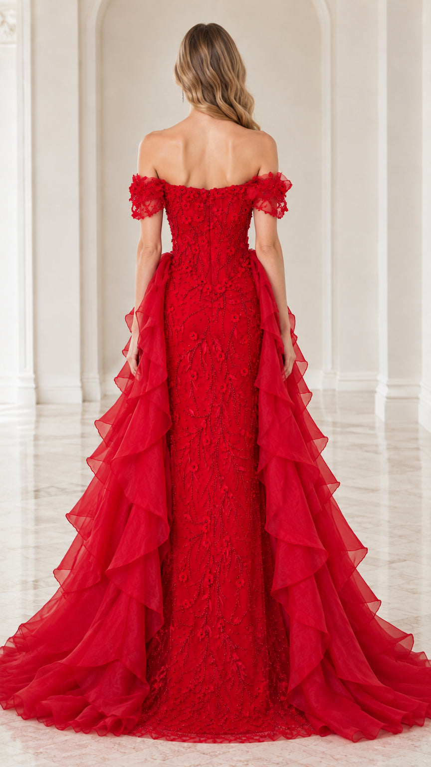 Back view of red beaded off-the-shoulder gown displaying long flowing train