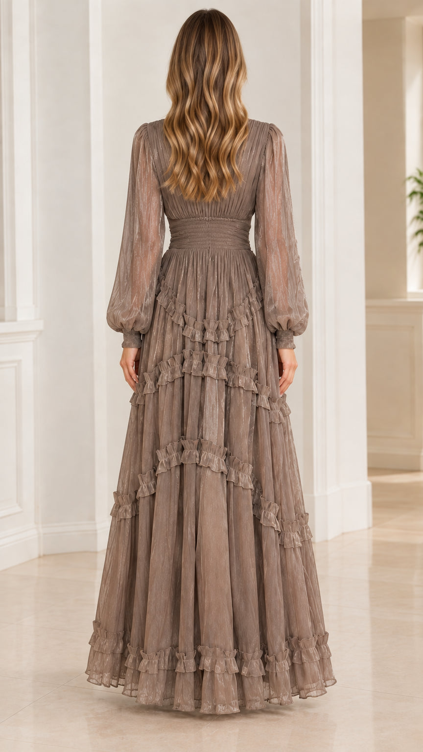 Back view of taupe plissé maxi dress showing tiered ruffled skirt flow