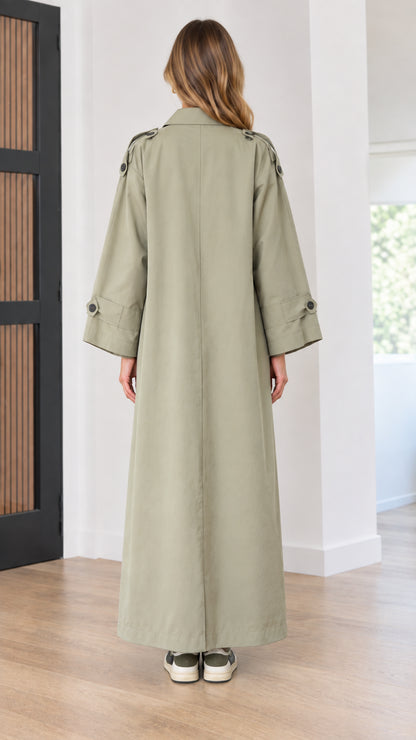 Back view of long trench dress showing inverted pleat in sage green
