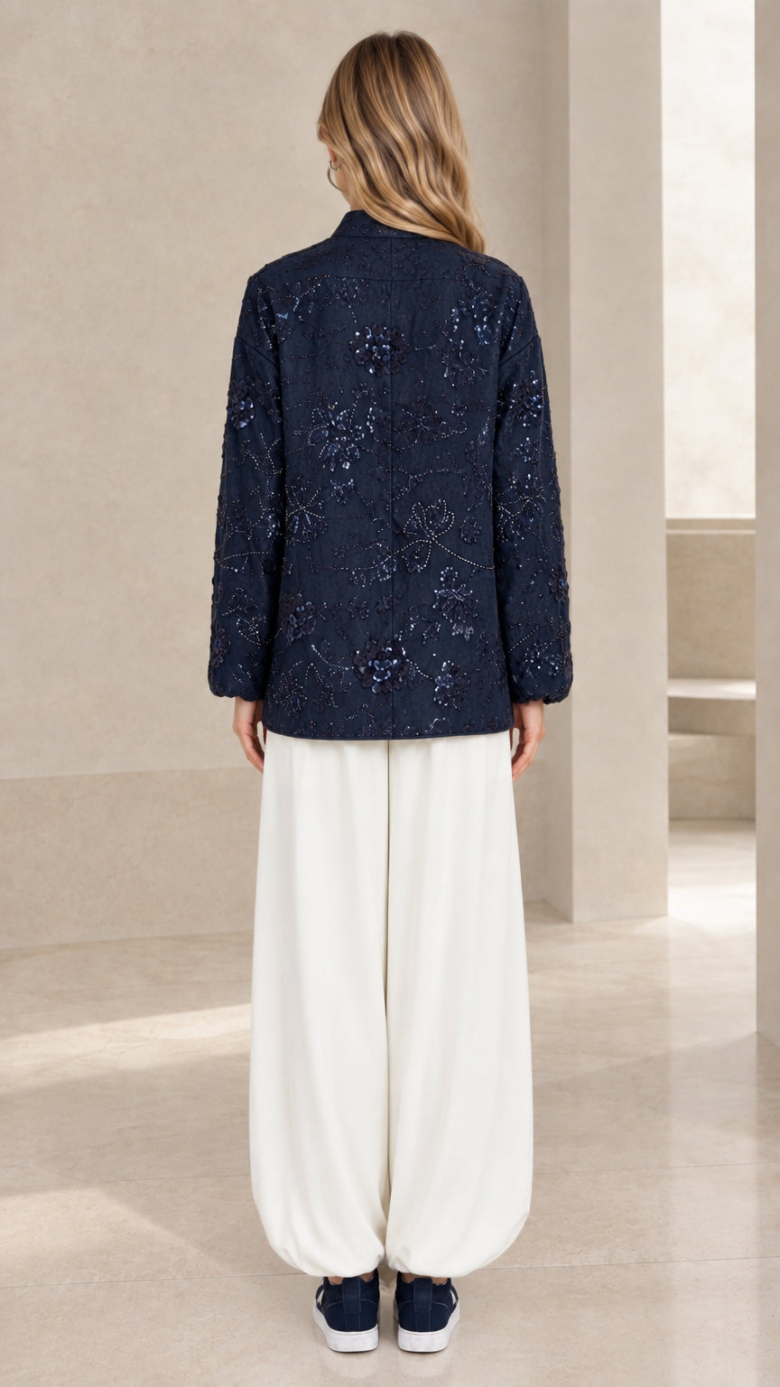 Back view of navy blue floral sequin embellished jacket top