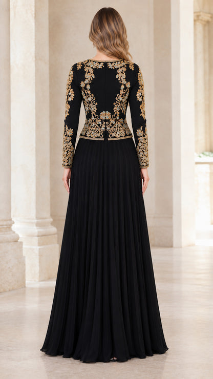 Back view of black long sleeve evening gown featuring gold scroll embroidery