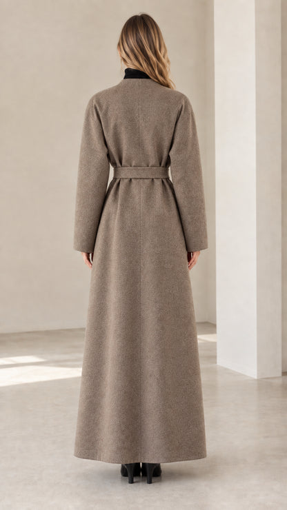 Back view of model in belted taupe maxi coat