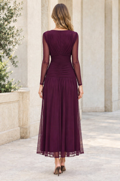 Back view of plum ruched mesh midi dress showing high back and flowing skirt