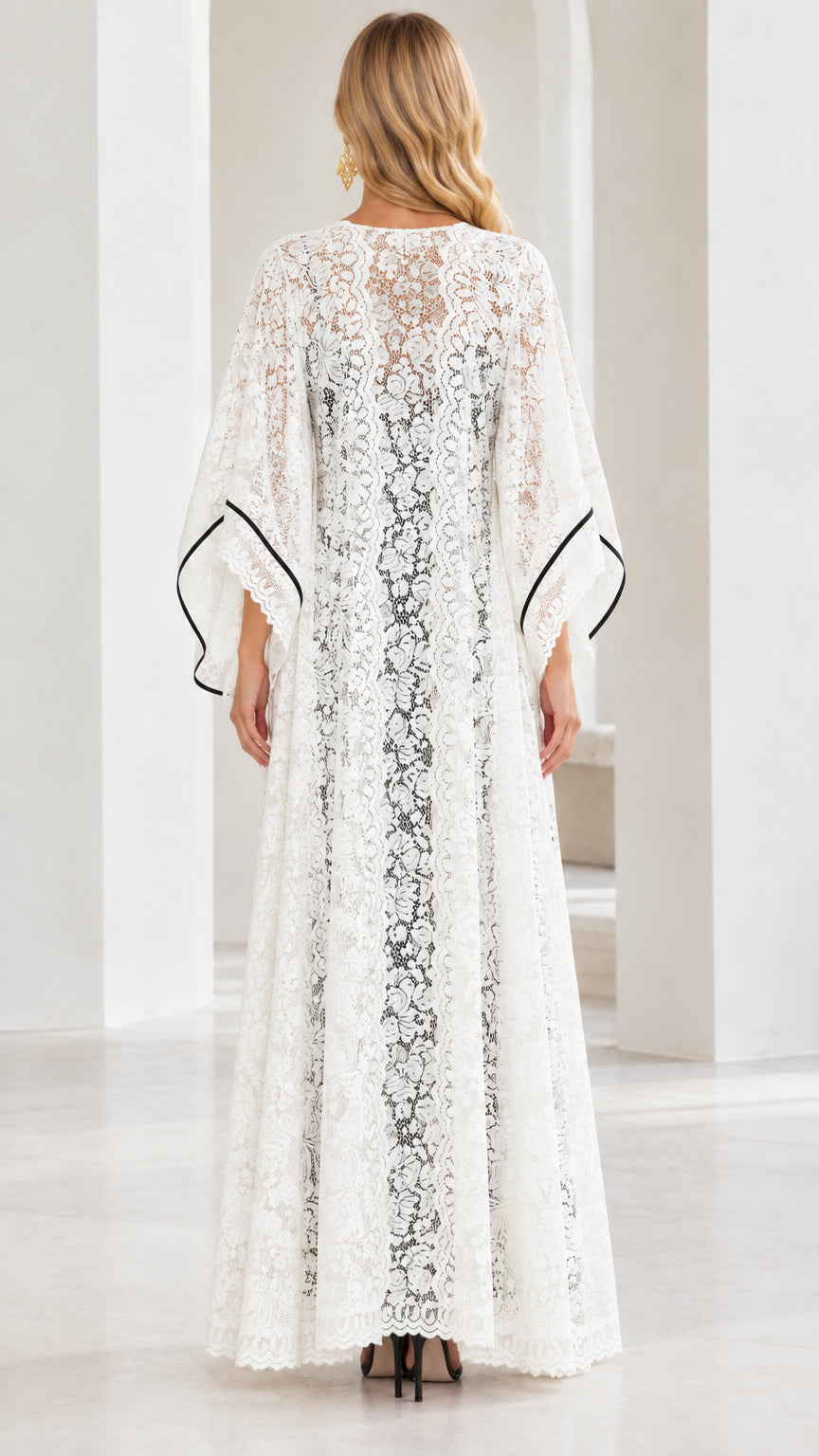 Back view of flowing white sheer floral lace maxi cardigan