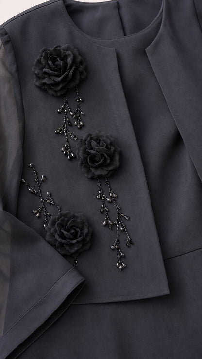 Close-up detail of Charcoal Grey 3D floral rosettes and delicate beaded stem embellishment