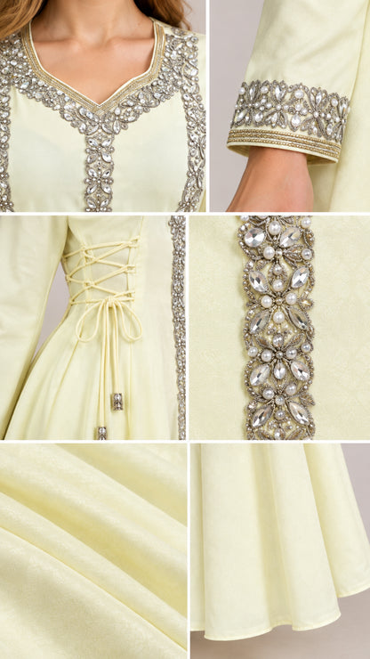 Close-up details of beaded neckline, pearl trim, side lace-up waist, and hem fabric