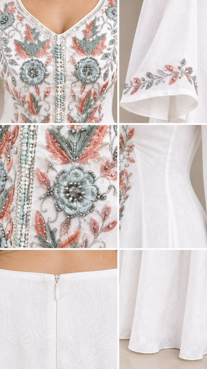 Close-up details of intricate floral embroidery, beaded cuffs, and zipper