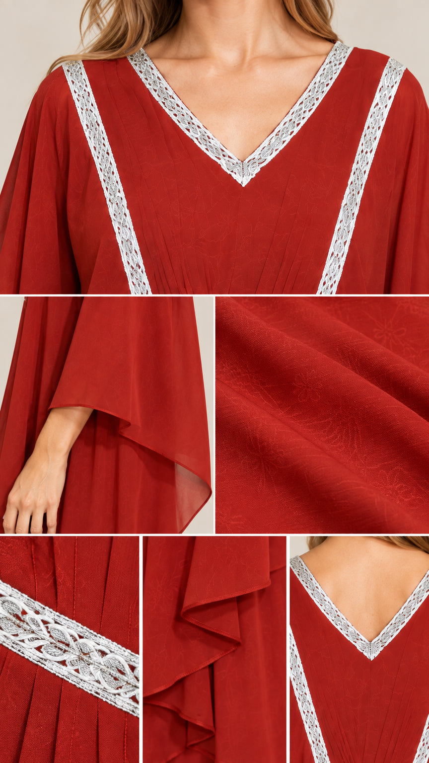 Close-up details of silver embroidered trim and textured chiffon fabric