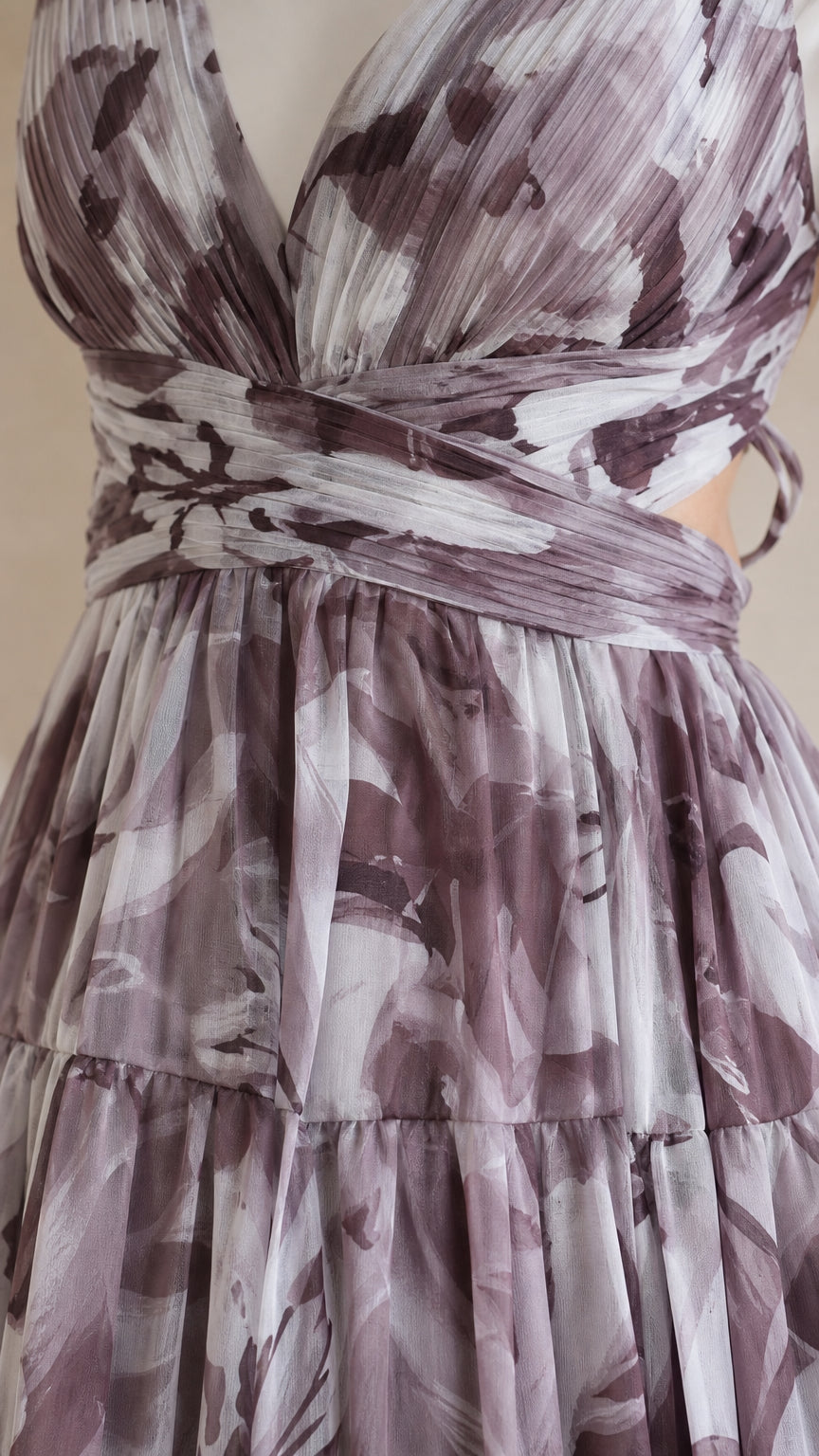 Close-up detail of pleated bodice and floral print chiffon fabric