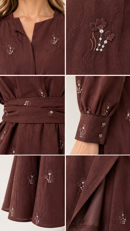 Close-up details of floral embroidery, faux pearl beads, waist belt, and cuff details