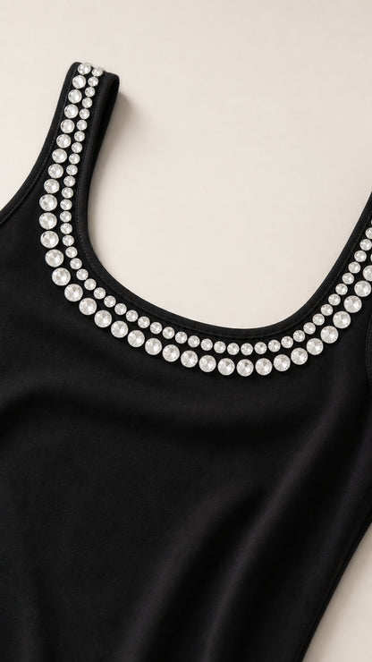 Close-up detail of sparkling crystal rhinestone trim on scoop neckline