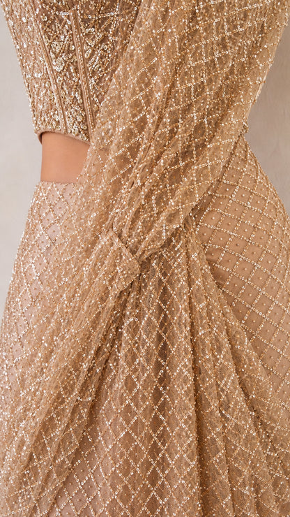 Close-up detail of geometric sequin lattice fabric and waist drape