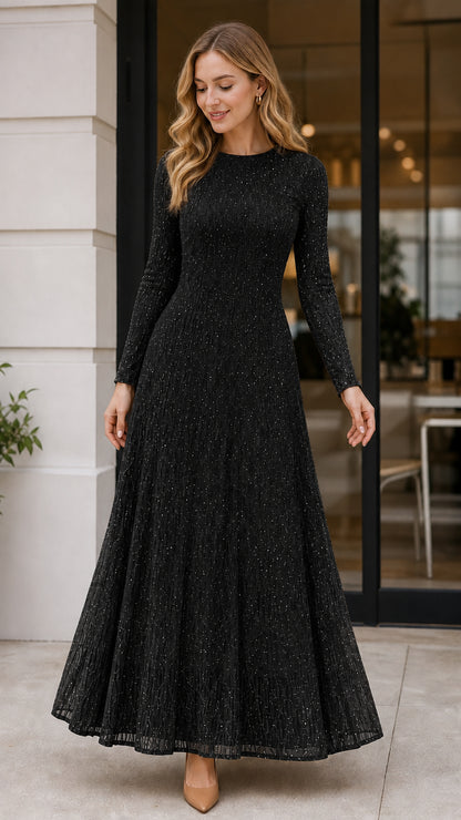 Model wearing Black sparkle long sleeve evening maxi dress