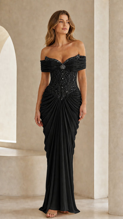 Full front view of black off-the-shoulder beaded evening gown