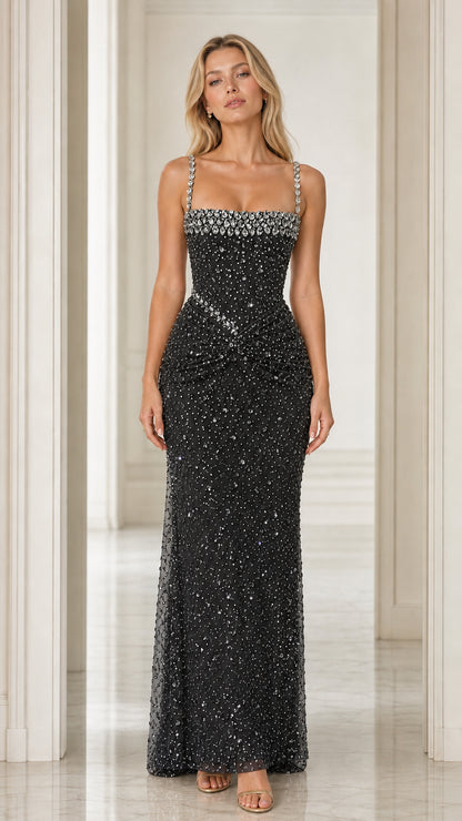 Front view of Black rhinestone embellished sleeveless evening gown