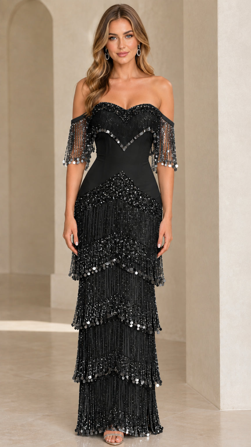 Full-length view of black off-the-shoulder sequin fringe evening dress
