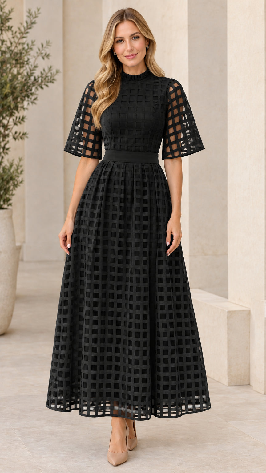 Front view of black mock neck sheer grid overlay maxi dress