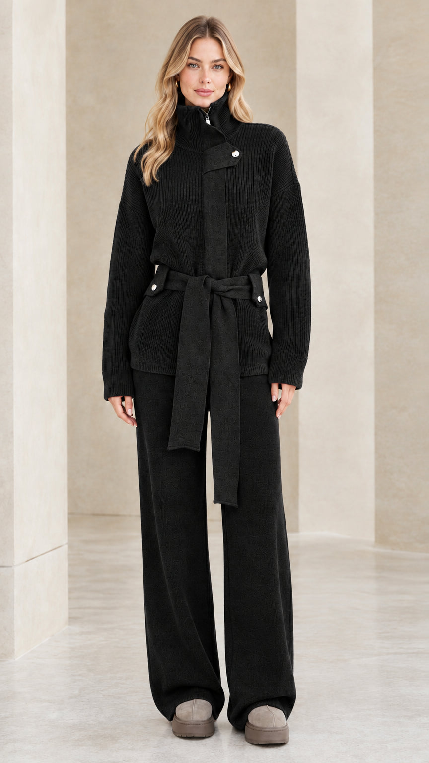 Full-length front view of the ribbed knit sweater and wide-leg pants set in classic black