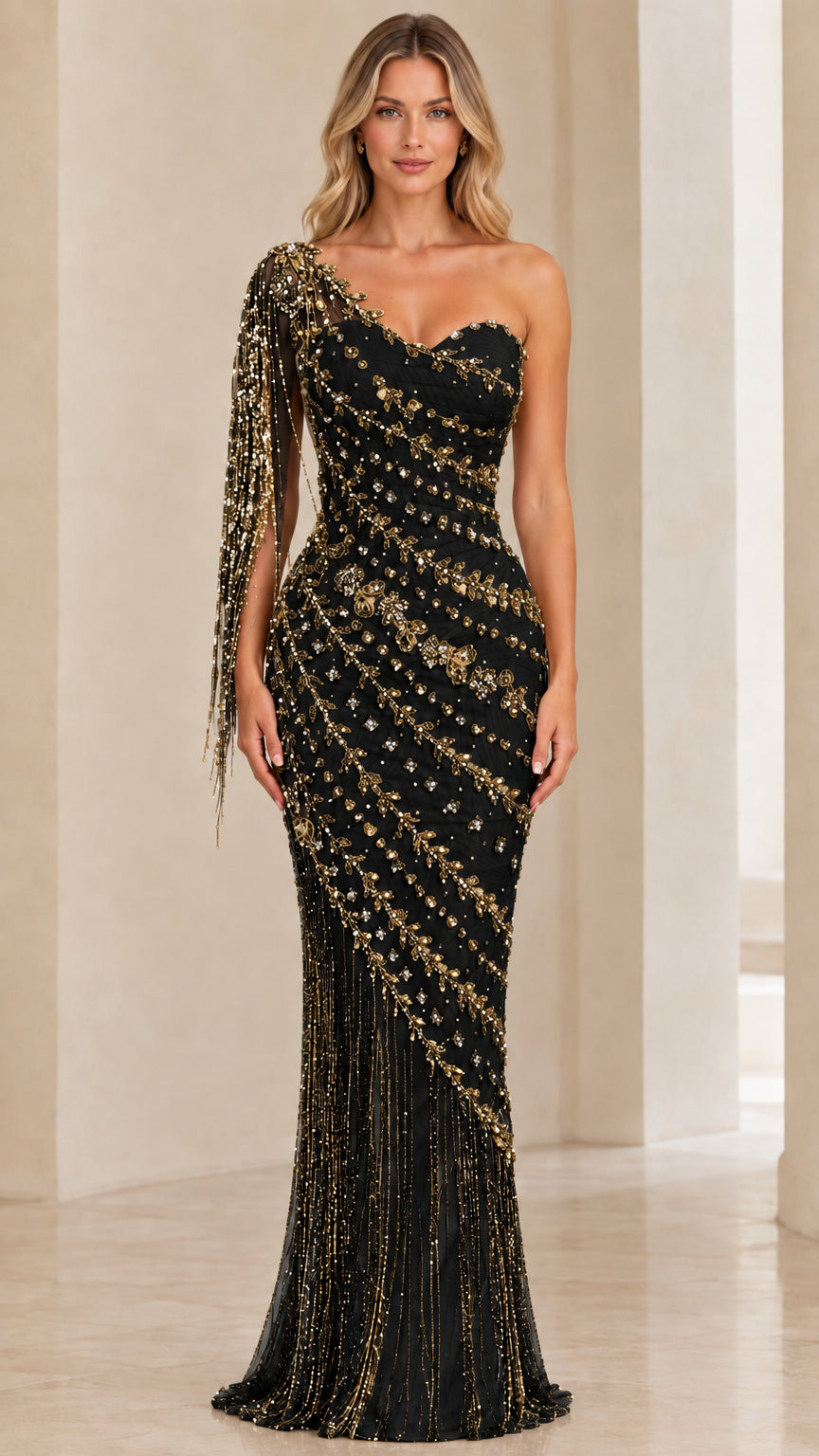 Front view of model wearing Black one-shoulder beaded fringe formal evening gown