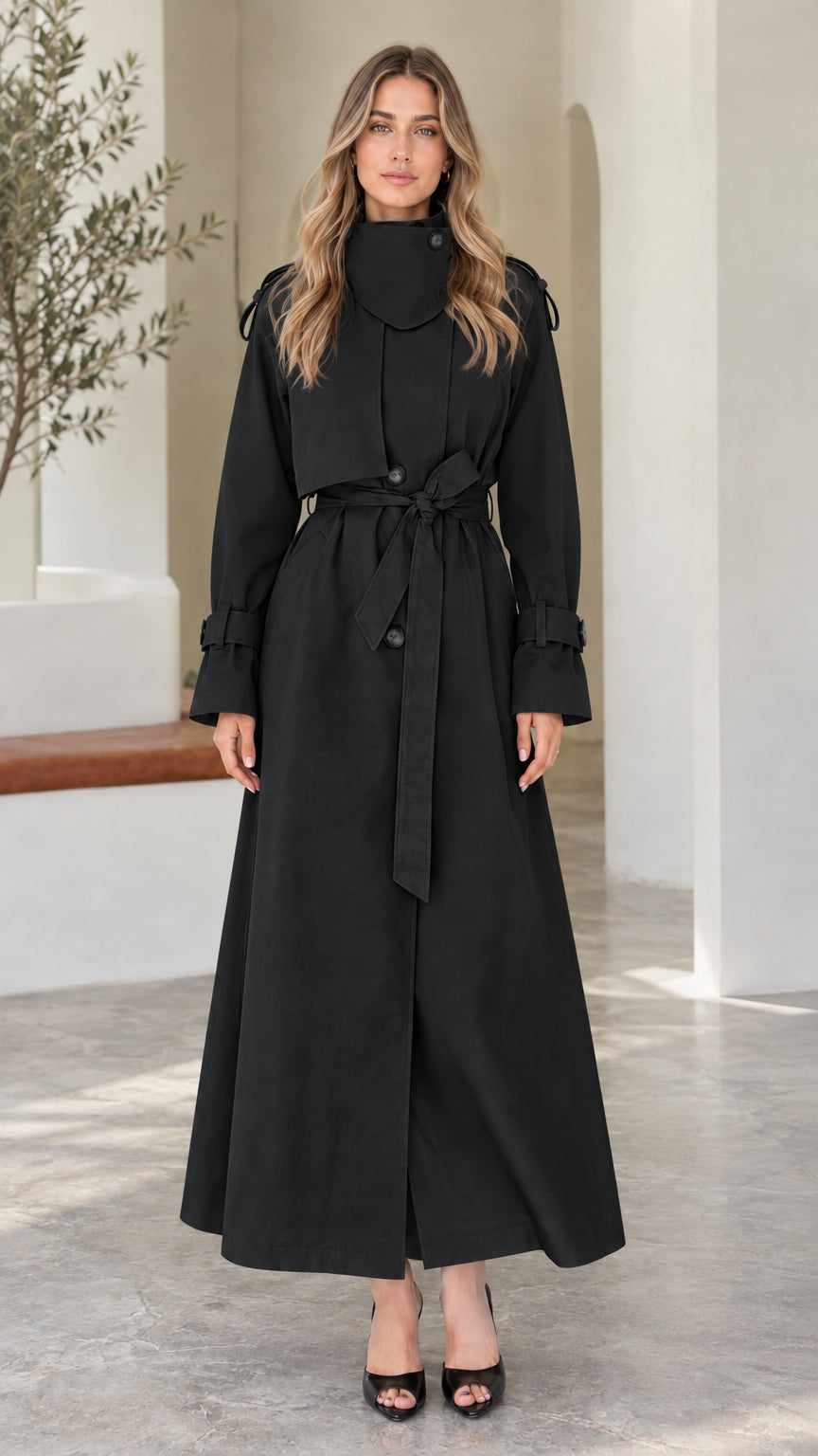 Front view of model wearing Black high-neck maxi belted trench coat