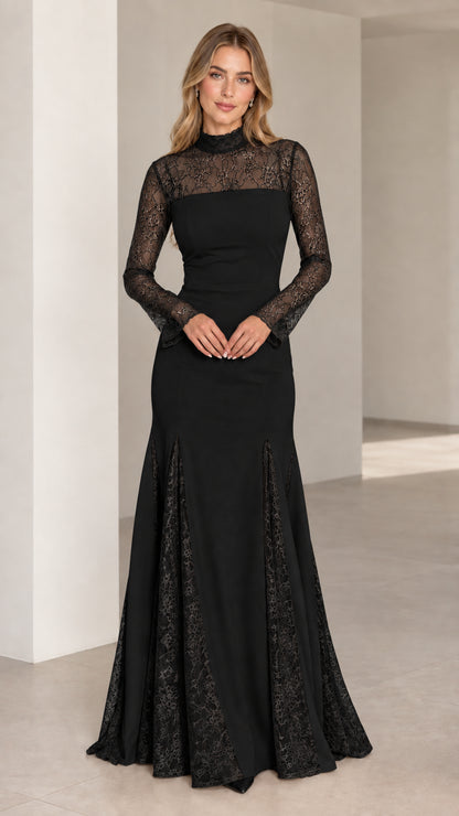 Front full-length view of black lace mock neck long sleeve mermaid gown