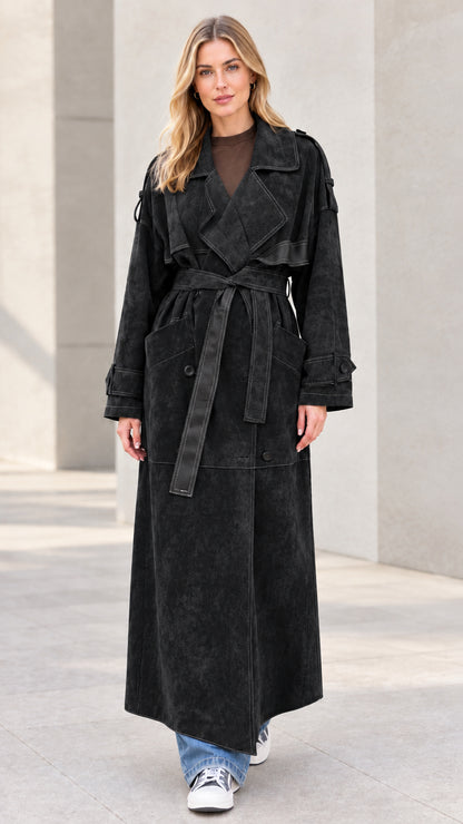 Front view of model wearing black maxi suede-finish trench coat