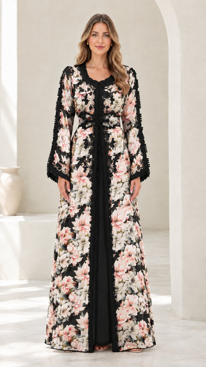 Full-length view of black floral embroidered kaftan dress with bell sleeves