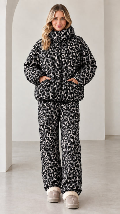 Full front view of model wearing black and grey leopard print puffer set