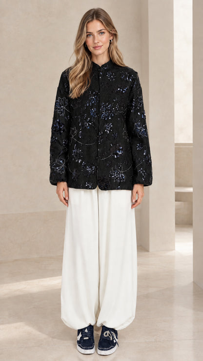 Full front view of black floral sequin embroidered button-down overshirt jacket