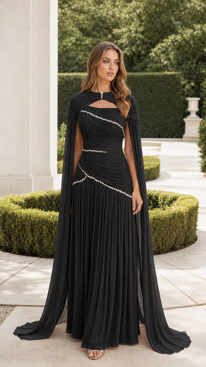 Black floor-length evening gown with attached cape sleeves and crystal waist beading