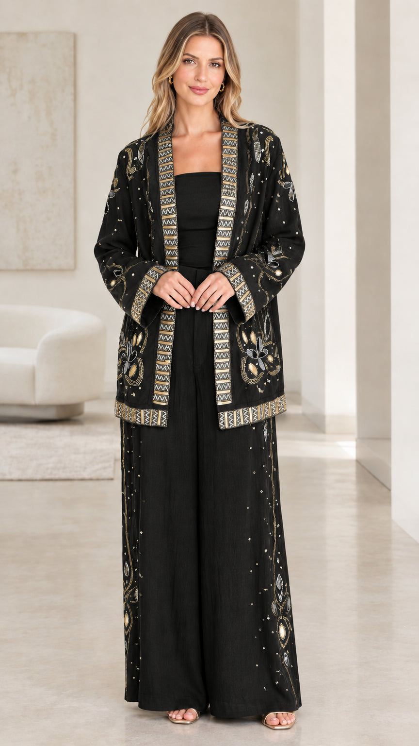 Front full-length view of black embroidered evening pant suit set