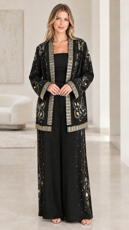 Front full-length view of black embroidered evening pant suit set