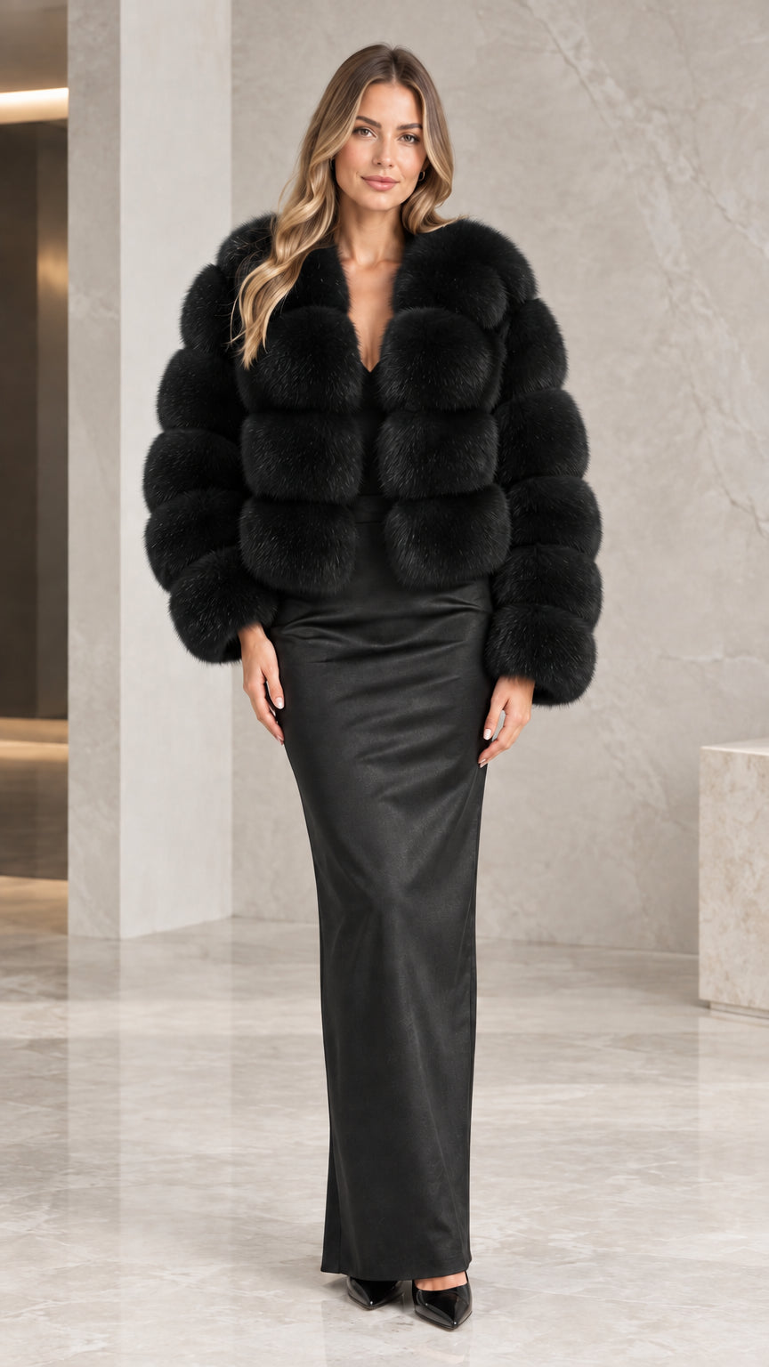 Front view of model wearing the classic black faux fur cropped jacket