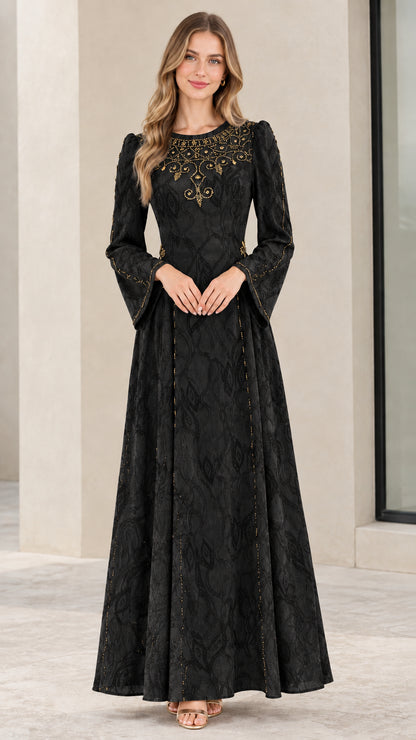 Model wearing black embellished long-sleeve jacquard maxi dress