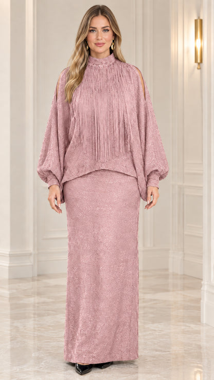 Front view of model wearing dusty pink fringe mock neck two-piece maxi dress set