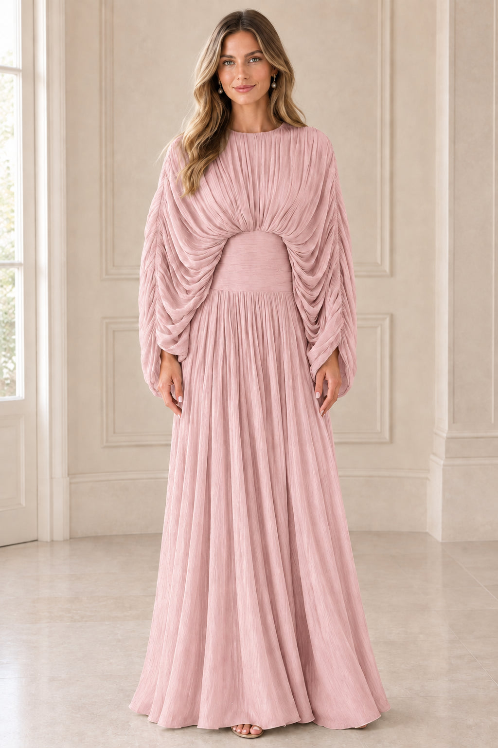Front view of model wearing Dusty Pink pleated cape sleeve evening gown