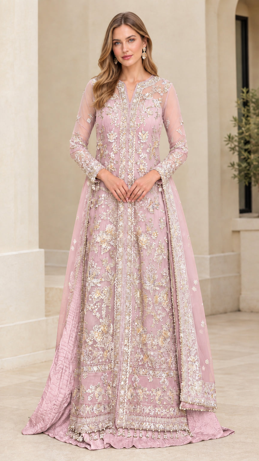 Model wearing dusty pink embroidered long sleeve formal gown with sweeping A-line skirt