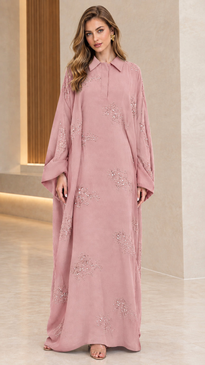 Front full-length view of woman wearing dusty pink collared sequin embellished abaya maxi dress