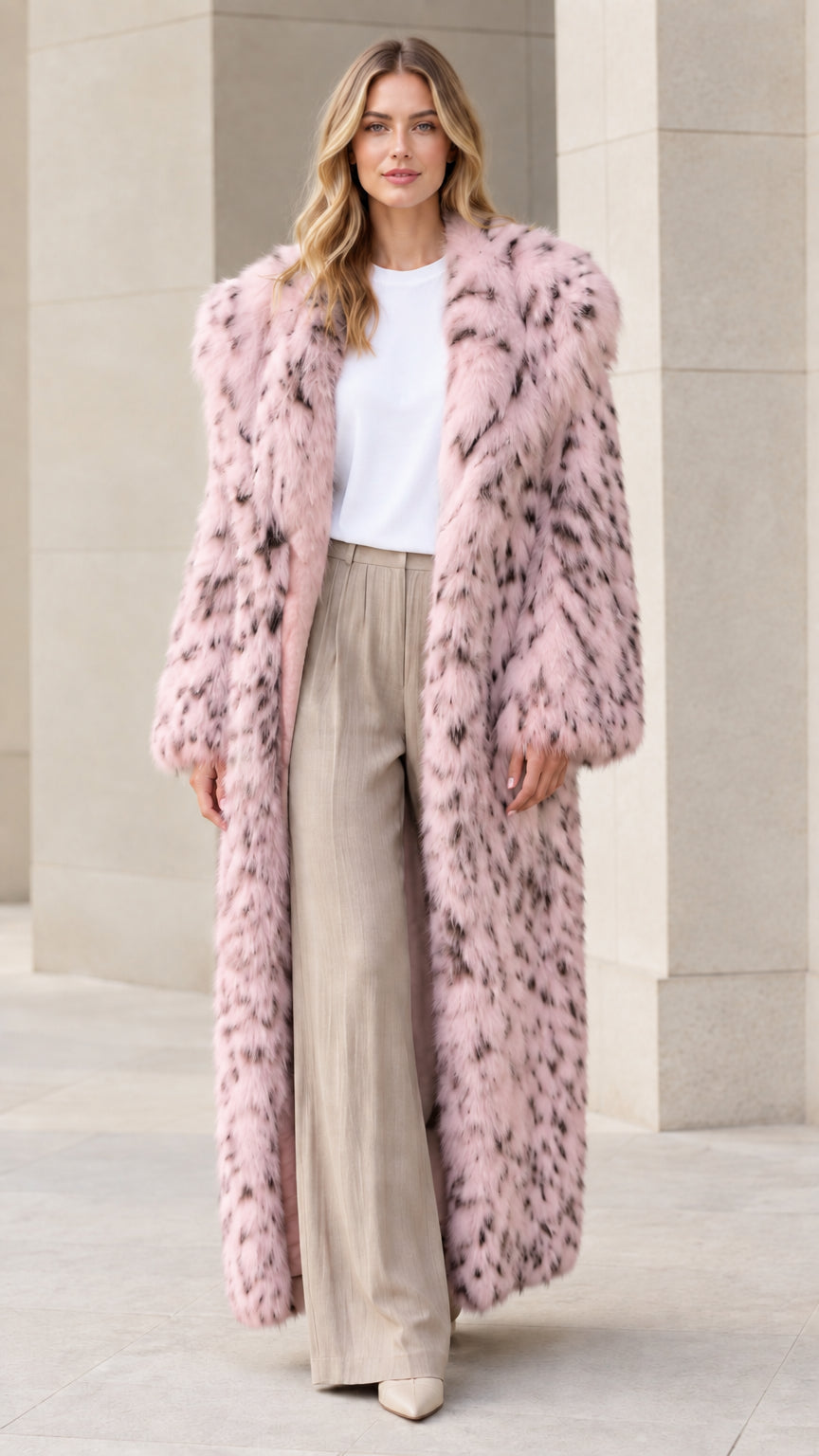 Front view of model wearing blush pink speckled faux fur maxi coat